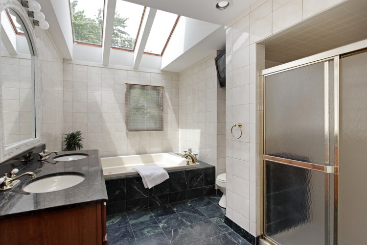 Natural and electric lighting in bathroom