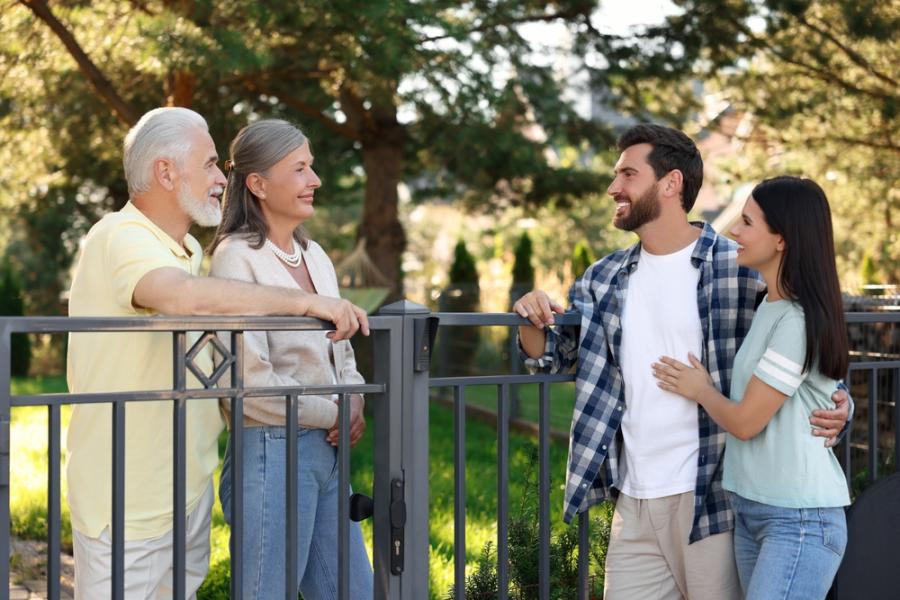 Two neighbour couples chatting